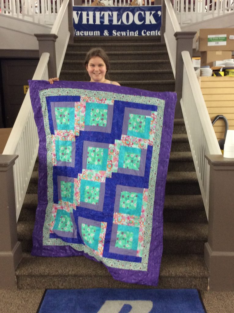 The quilt is called Nature and made by Lillian S.