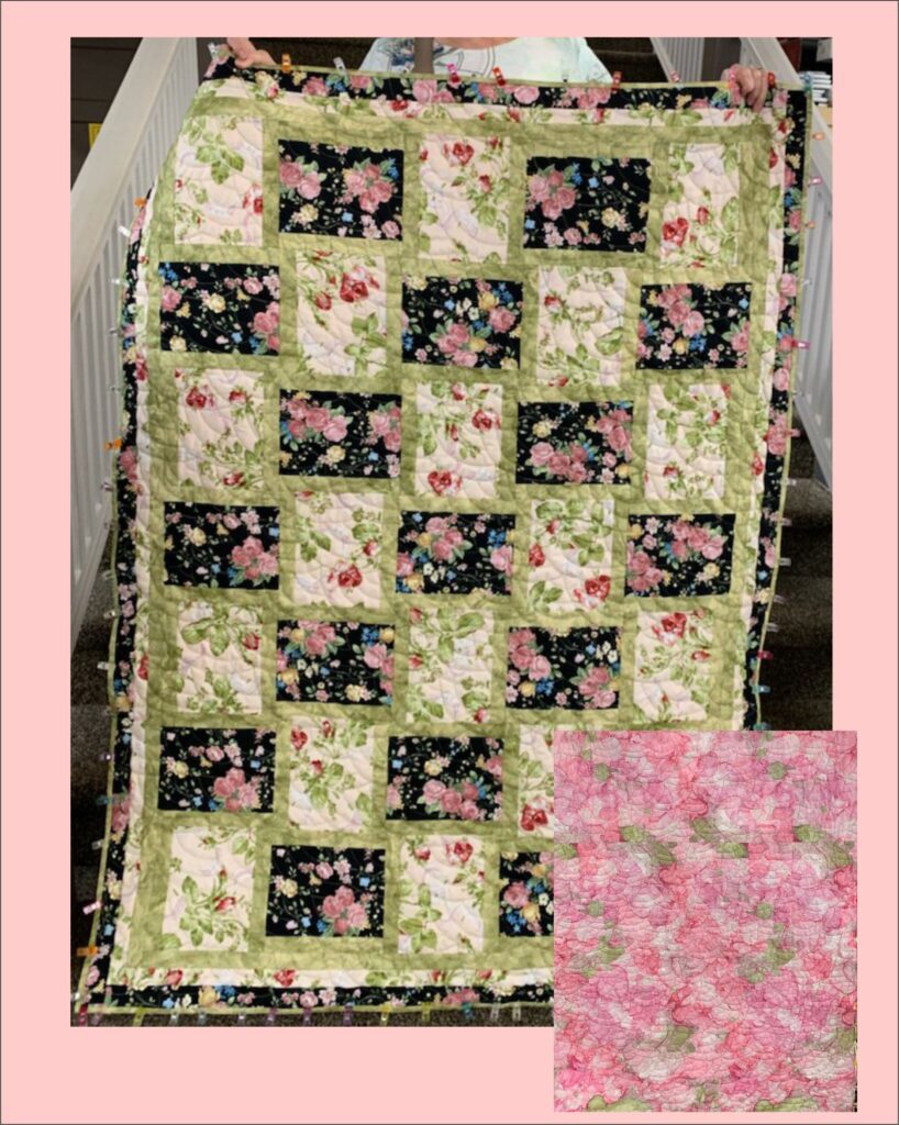 Doris R. completed her quilt on a Handi Quilter Sweet 16 using the free motion method.